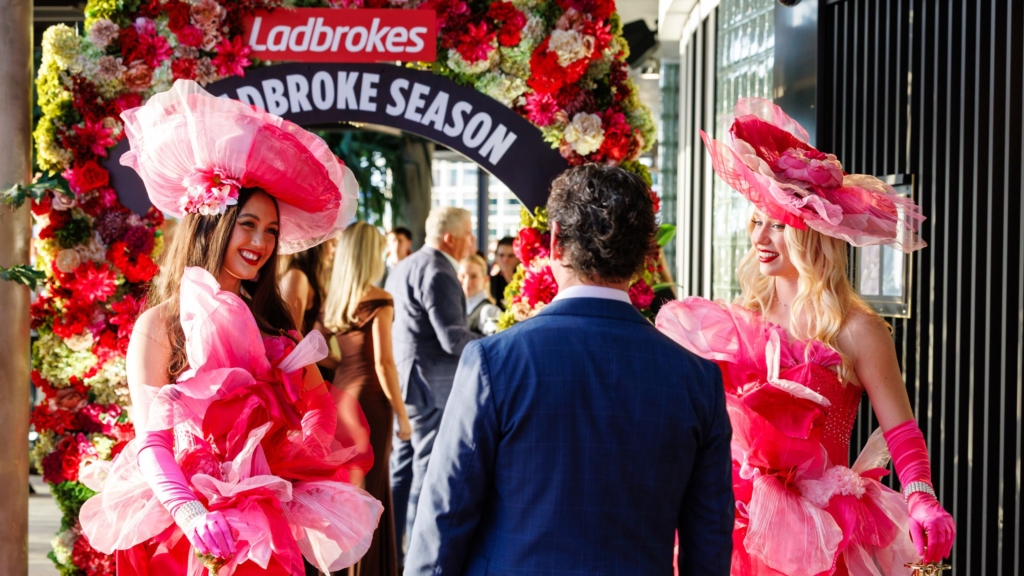 Image of smiling women at a ladbrokes corporate event