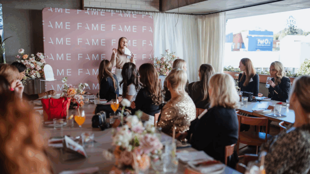Guests listening as April Booij, founder of FAME Event Design, speaks at the brand activation event in an intimate Brisbane venue.