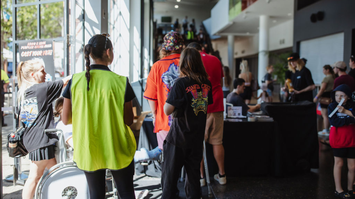 Event coordinator managing logistics at Growl Racing event